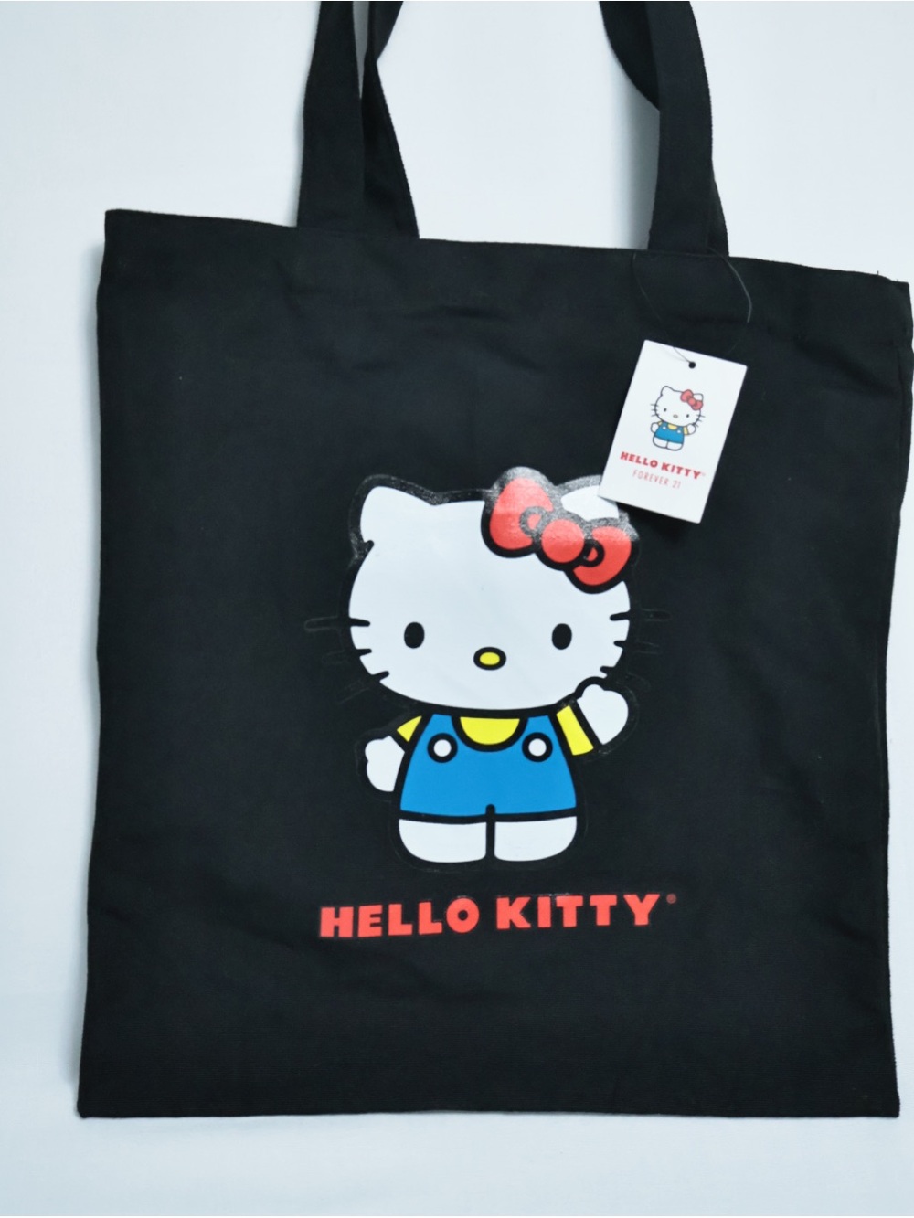 Hello Kitty Black Tote Bag with Red Bow and Blue Outfit